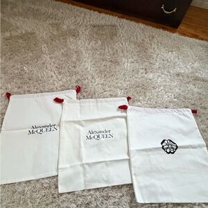 Alexander McQueen White Dust Bags with Red drawstrings